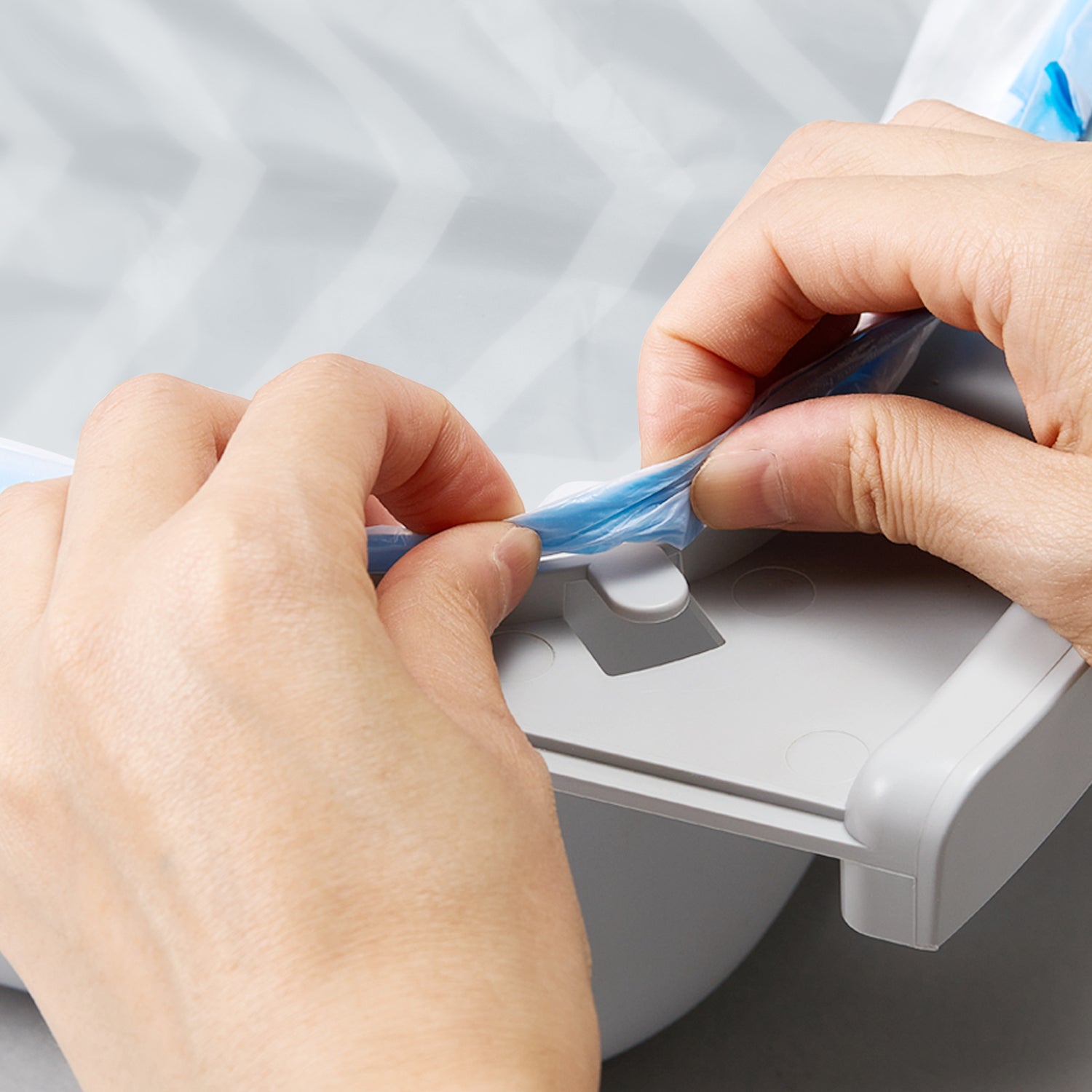 PuraX Automatic Litter Box Trash Bag demonstrating seamless fit on PETKIT litter box waste bin, ensuring tidy and leak-free waste management